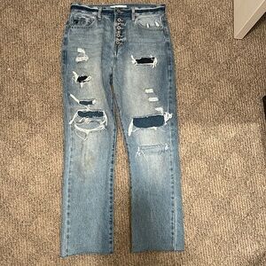 KANCAN baggy, wide leg light blue washed distressed jeans with patches.